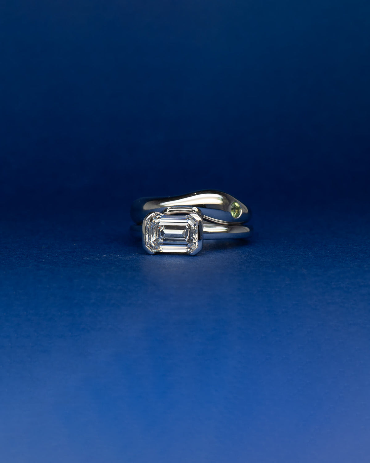 Bespoke east west half bezel solitaire engagement ring in 18K white gold with 2.21ct emerald cut lab grown diamond — handcrafted by Benjamin Rose Melbourne