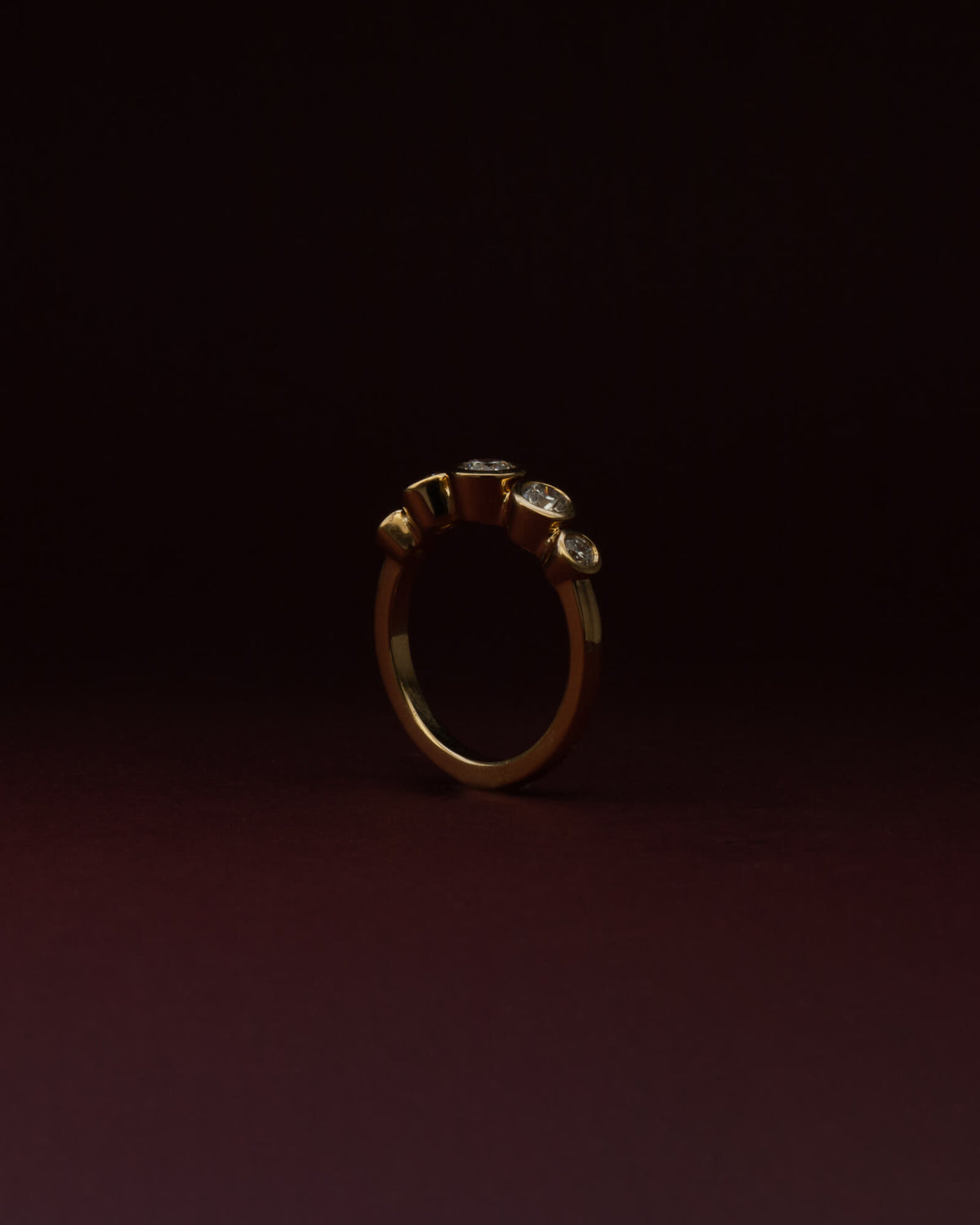 espoke five stone bezel set diamond engagement ring in 18K yellow gold — natural diamonds, handcrafted by Benjamin Rose Melbourne