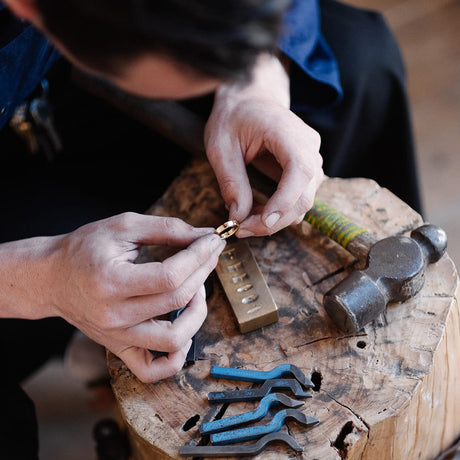 Benjamin Rose handcrafting a bespoke wedding band at his Collingwood bench — book an appointment Melbourne
