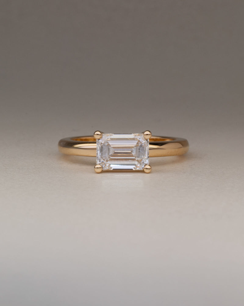 Bespoke east west four claw emerald cut solitaire engagement ring in 18K yellow gold with 1.52ct lab grown diamond — handcrafted by Benjamin Rose Melbourne