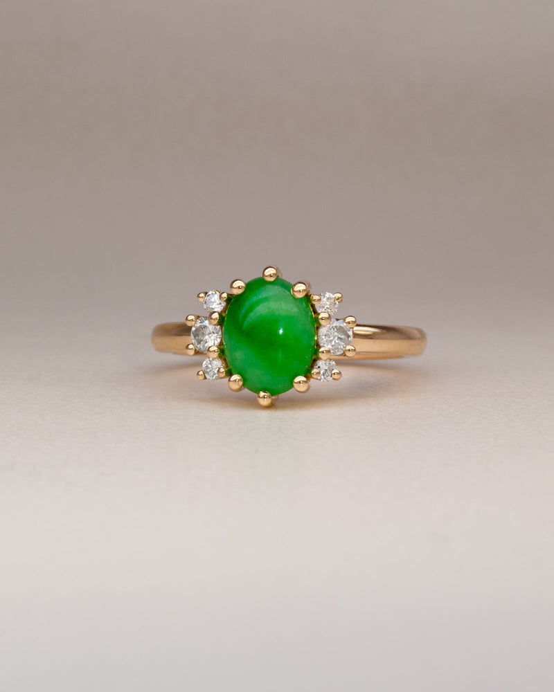 Bespoke jade cluster engagement ring in 18K yellow gold with oval jade cabochon and natural heirloom diamond surround — handcrafted by Benjamin Rose Melbourne
