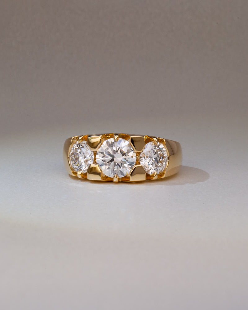 Bespoke Nika three stone engagement ring in 18K yellow gold with 1.21ct round brilliant lab diamond and 0.71ct lab diamond side stones — handcrafted by Benjamin Rose Melbourne