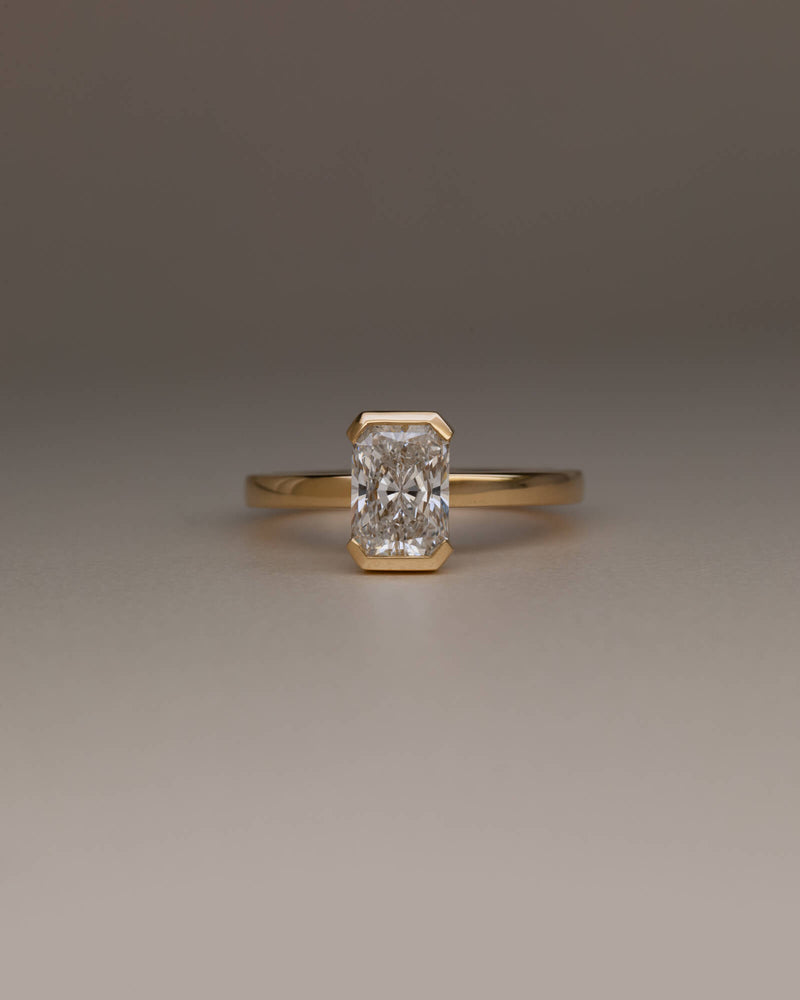 Bespoke radiant cut half bezel solitaire engagement ring in 18K yellow gold with 1.24ct natural diamond — handcrafted by Benjamin Rose Melbourne