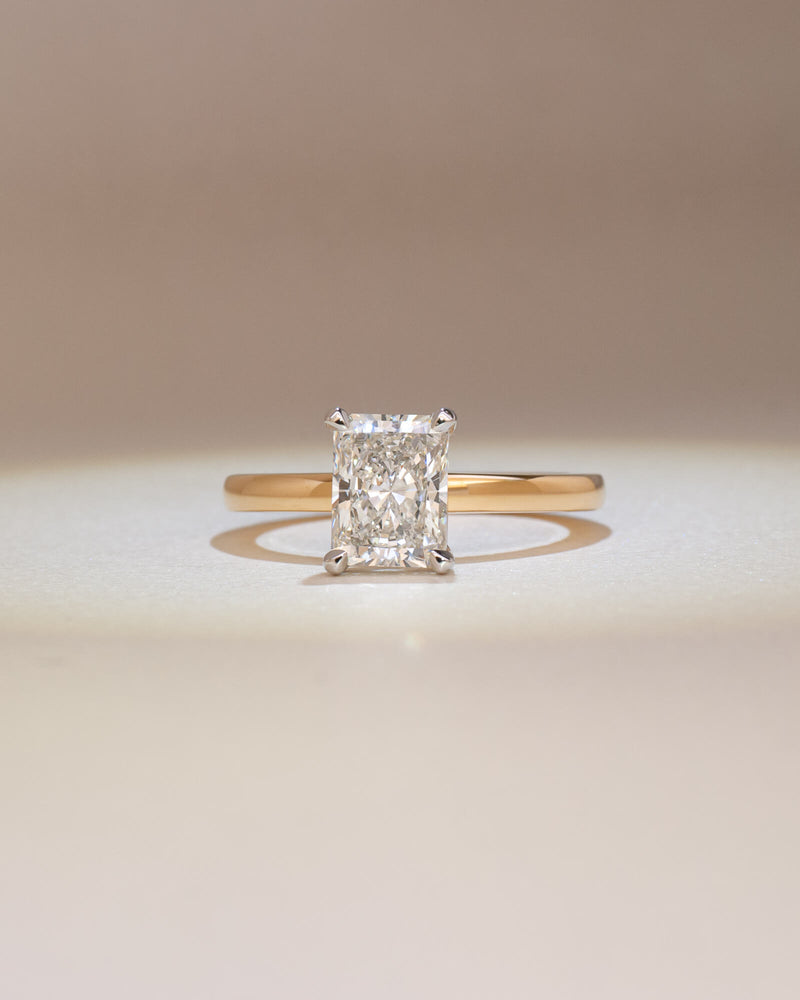 Bespoke radiant cut solitaire engagement ring with talon claw platinum setting on 18K yellow gold band — 1.50ct natural diamond, handcrafted by Benjamin Rose Melbourne