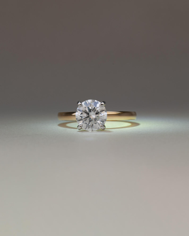 Bespoke round brilliant solitaire engagement ring with talon claw setting in platinum on 18K yellow gold band — 2.01ct lab grown diamond, handcrafted by Benjamin Rose Melbourne