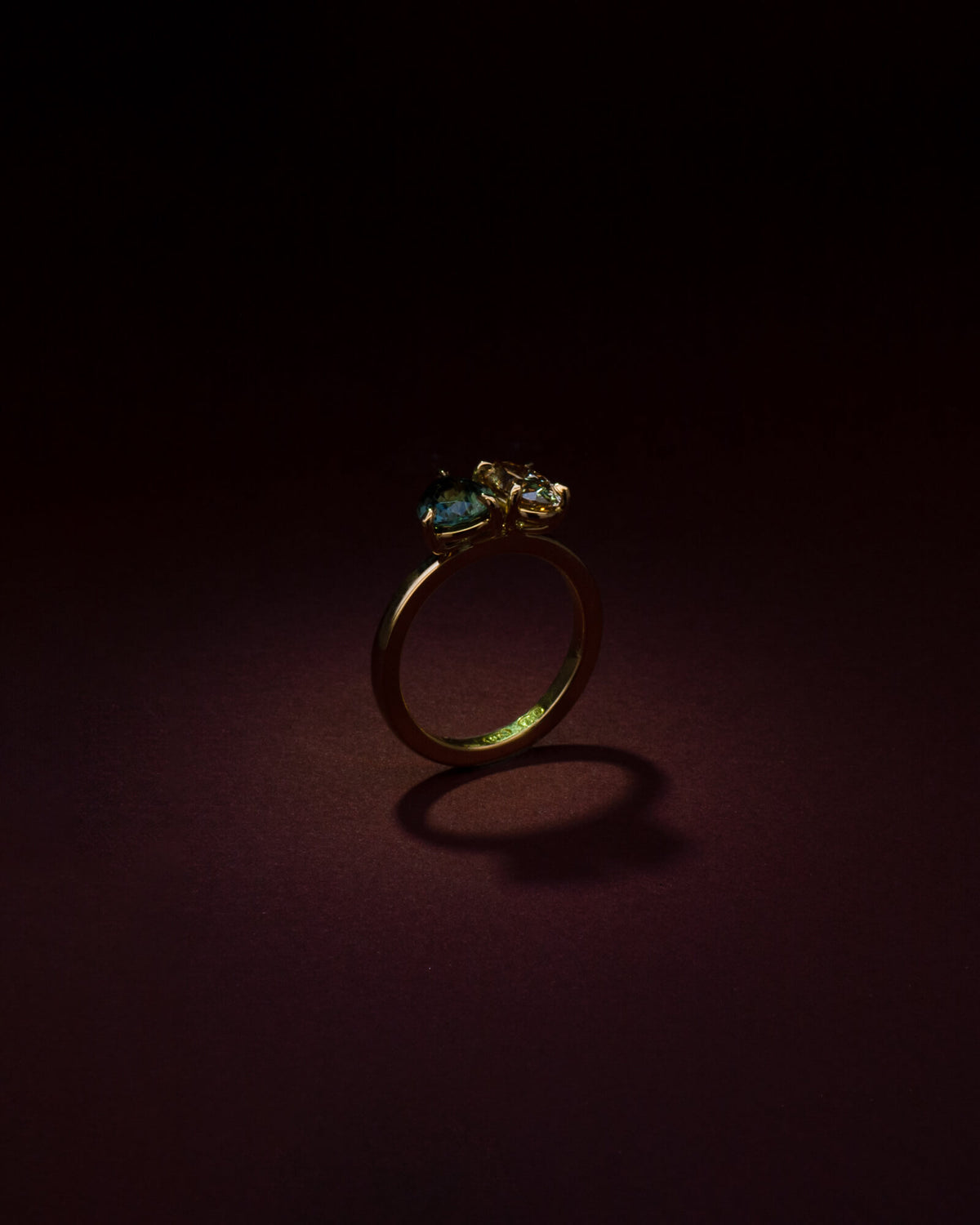 Bespoke toi et moi engagement ring in 18K yellow gold with pear Australian sapphire and oval champagne diamond — handcrafted by Benjamin Rose Melbourne