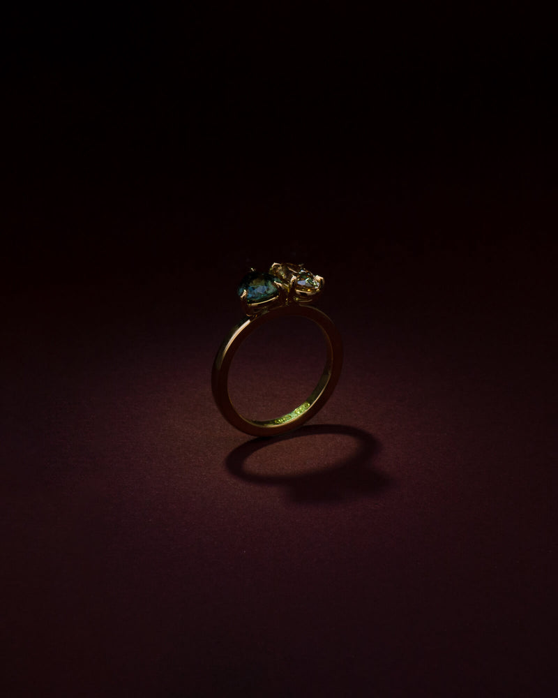 Bespoke toi et moi engagement ring in 18K yellow gold with pear Australian sapphire and oval champagne diamond — handcrafted by Benjamin Rose Melbourne